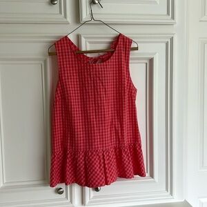 Adorable j Crew top with a ruffle 20 inches from pit to pit. 25 inches long